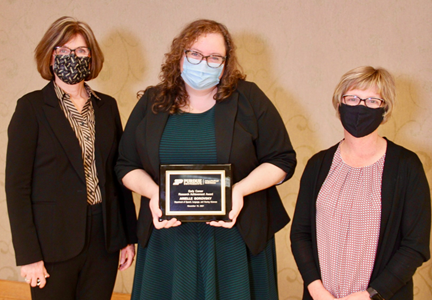 Photo of Dr. Arielle Borovsky receiving the College of Health and Human Sciences 2021 Early Career Research Achievement Award.